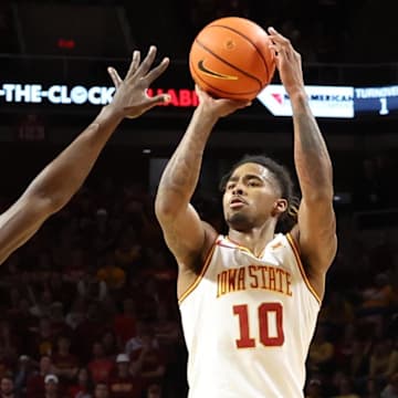 Mar 4, 2025; Ames, Iowa, USA;  Iowa State Cyclones guard Keshon Gilbert (10) shoots against the Brigham Young Cougars in the first half at James H. Hilton Coliseum.