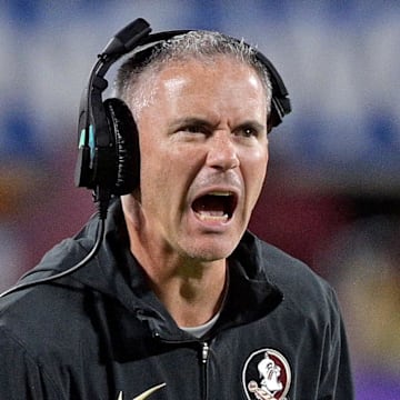 Sep 3, 2023; Orlando, Florida, USA; Florida State Seminoles head coach Mike Norvell is excited during the fourth quarter against the Louisiana State Tigers at Camping World Stadium. Mandatory Credit: Melina Myers-Imagn Images