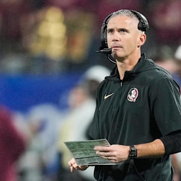 Dec 2, 2023; Charlotte, NC, USA;  Florida State Seminoles head coach Mike Norvell looks on during the fourth quarter against the Louisville Cardinals at Bank of America Stadium. Mandatory Credit: Jim Dedmon-Imagn Images