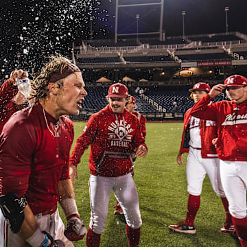 Nebraska right fielder Robby Bolin celebrates with teammates after his walk-off hit in the 10th inning over Michigan State at the Big Ten Tournament in Omaha.