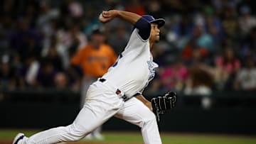 Hooks pitcher Miguel Ullola throws a pitch on Opening Night at Whataburger Field on Friday, April 5, 2024, in Corpus Christi, Texas.