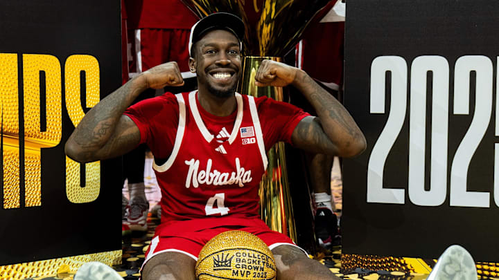Nebraska forward Juwan Gary sits in front with his MVP ball as the team poses after winning the College Basketball Crown in Las Vegas. Nebraska forward Juwan Gary sits in front with his MVP ball as the team poses after winning the College Basketball Crown in Las Vegas.
