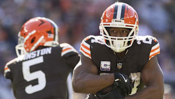 Oct 27, 2024; Cleveland, Ohio, USA; Cleveland Browns running back Nick Chubb (24) runs the ball against the Baltimore Ravens during the second quarter at Huntington Bank Field. Mandatory Credit: Scott Galvin-Imagn Images
