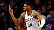 Milwaukee Bucks forward Giannis Antetokounmpo reacts to scoring a basket.