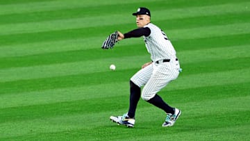 Oct 30, 2024; Bronx, New York, USA;  New York Yankees outfielder Aaron Judge (99) drops a fly ball during the fifth inning against the Los Angeles Dodgers during game five of the 2024 MLB World Series at Yankee Stadium. Mandatory Credit: James Lang-Imagn Images