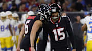 Jan 11, 2025; Houston, Texas, USA;  Houston Texans punter Ka'imi Fairbairn (15) celebrates a field goal with punter Tommy Townsend (6) against the Los Angeles Chargers in the third quarter in an AFC wild card game at NRG Stadium. Mandatory Credit: Thomas Shea-Imagn Images