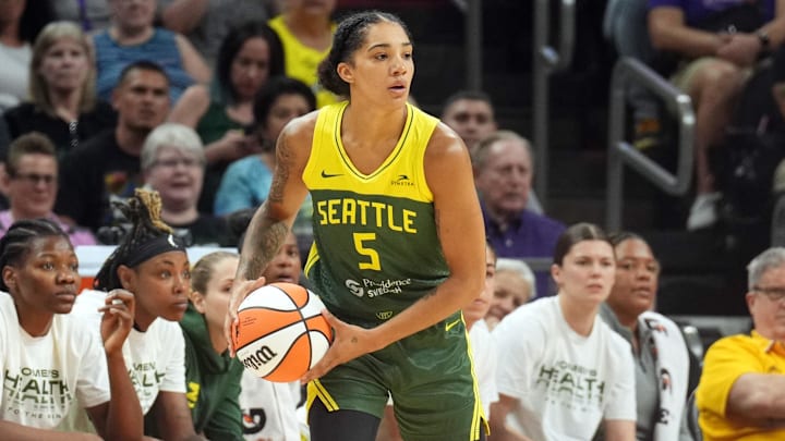 Seattle Storm forward Gabby Williams (5) controls the ball against the Phoenix Mercury against the Phoenix Mercury/ Seattle Storm forward Gabby Williams (5) controls the ball against the Phoenix Mercury against the Phoenix Mercury/