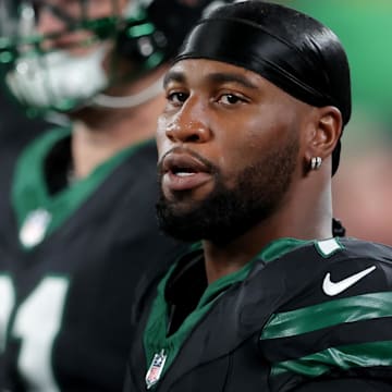Oct 31, 2024; East Rutherford, New Jersey, USA; New York Jets defensive end Haason Reddick (7) on the sidelines during the first quarter against the Houston Texans at MetLife Stadium. Mandatory Credit: Brad Penner-Imagn Images
