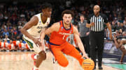Mar 24, 2024; Memphis, TN, USA; Clemson Tigers guard Chase Hunter (1) controls the ball against Baylor Bears guard Ja'Kobe Walter (4) in the first half in the second round of the 2024 NCAA Tournament at FedExForum. Mandatory Credit: Petre Thomas-USA TODAY Sports