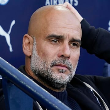 Pep Guardiola's Manchester City strengthened their Champions League qualification bid by beating Bournemouth.