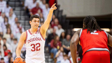 Indiana's Trey Galloway (32) direcrts the offense during the Indiana versus Ohio State men's basketball game at Simon Skjodt Assembly Hall on Saturday, March 8, 2025.