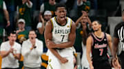 Mar 8, 2025; Waco, Texas, USA; Baylor Bears guard VJ Edgecombe (7) reacts after a play against the Houston Cougars during the second half at Paul and Alejandra Foster Pavilion. Mandatory Credit: Chris Jones-Imagn Images