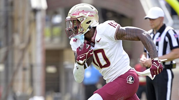 Apr 20, 2024; Tallahassee, Florida, USA; Florida State Seminoles wide receiver Malik Benson (10) runs with the ball during th