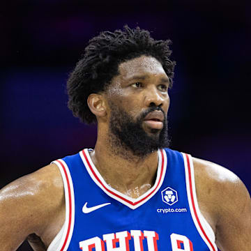 Feb 20, 2025; Philadelphia, Pennsylvania, USA; Philadelphia 76ers center Joel Embiid (21) looks on during the third quarter against the Boston Celtics at Wells Fargo Center. Mandatory Credit: Bill Streicher-Imagn Images