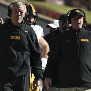Nov 23, 2024; College Park, Maryland, USA;  Iowa Hawkeyes head coach Kirk Ferentz looks onto the field during the first half against the Maryland Terrapins at SECU Stadium. Mandatory Credit: Tommy Gilligan-Imagn Images