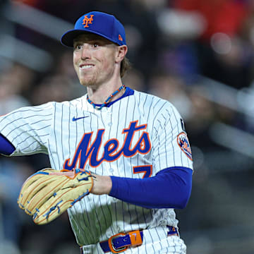 Apr 17, 2025; New York City, New York, USA; New York Mets third baseman Brett Baty (7) throws the ball to first base for an out during the third inning against the St. Louis Cardinals at Citi Field. Mandatory Credit: Vincent Carchietta-Imagn Images