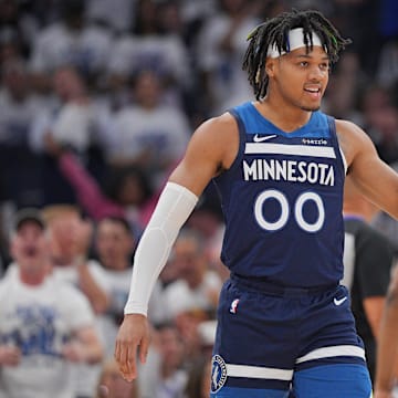 May 24, 2025; Minneapolis, Minnesota, USA; Minnesota Timberwolves guard Terrence Shannon Jr. (00) reacts against the Oklahoma City Thunder during the first half in game three of the western conference finals for the 2025 NBA Playoffs at Target Center. Mandatory Credit: Brad Rempel-Imagn Images