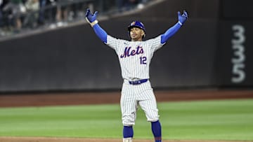 Sep 3, 2024; New York City, New York, USA;  New York Mets shortstop Francisco Lindor (12) celebrates after hitting an RBI double in the eighth inning against the Boston Red Sox at Citi Field. Mandatory Credit: Wendell Cruz-Imagn Images