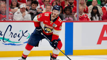 Jun 17, 2025; Sunrise, Florida, USA; Florida Panthers left wing Matthew Tkachuk (19) controls the puck against the Edmonton Oilers during the second period in game six of the 2025 Stanley Cup Final at Amerant Bank Arena. 