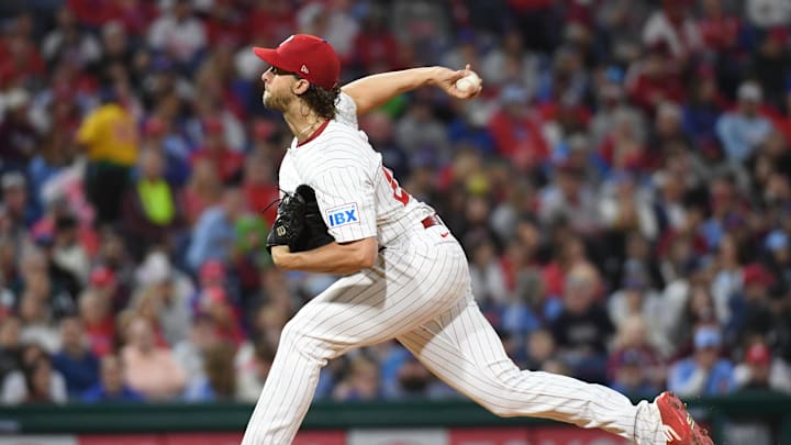 Sep 23, 2024; Philadelphia, Pennsylvania, USA; Philadelphia Phillies pitcher Aaron Nola (27) throws a pitch during the fourth inning against the Chicago Cubs at Citizens Bank Park. Mandatory Credit: Eric Hartline-Imagn Images