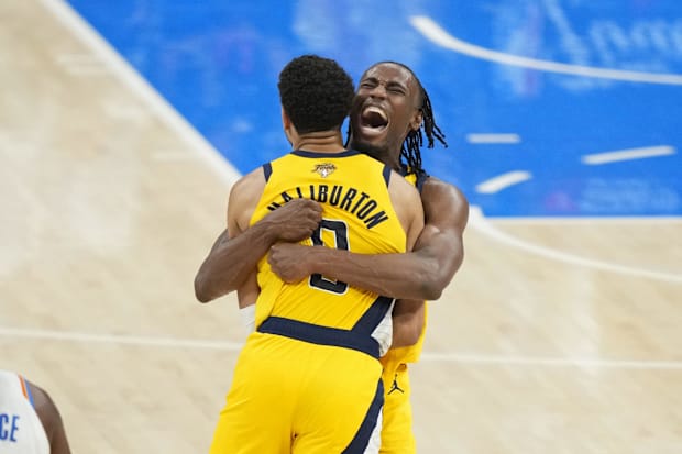 Aaron Nesmith celebrates with Tyrese Haliburton after Haliburton’s game-winner.