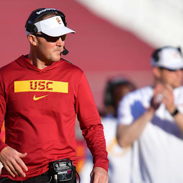 Nov 16, 2024; Los Angeles, California, USA; Southern California Trojans head coach Lincoln Riley watches game action against the Nebraska Cornhuskers during the second half at the Los Angeles Memorial Coliseum. Mandatory Credit: Gary A. Vasquez-Imagn Images