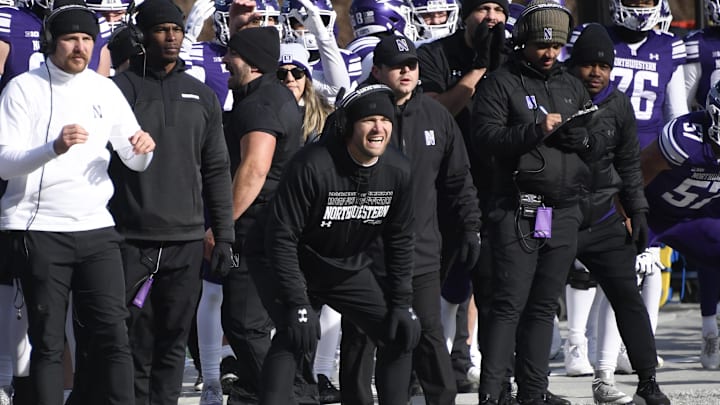 Nov 30, 2024; Chicago, Illinois, USA; Northwestern Wildcats head coach David Braun looks on during the first half against Illinois Fighting Illini at Wrigley Field. Mandatory Credit: Matt Marton-Imagn Images Nov 30, 2024; Chicago, Illinois, USA; Northwestern Wildcats head coach David Braun looks on during the first half against Illinois Fighting Illini at Wrigley Field. Mandatory Credit: Matt Marton-Imagn Images