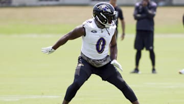 Baltimore Ravens linebacker Roquan Smith drops back into coverage during an NFL OTA.