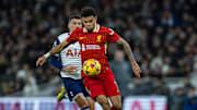 Liverpool's Luis Diaz holds off Pedro Porro of Tottenham Hotspur