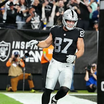 Dec 14, 2023; Paradise, Nevada, USA; Las Vegas Raiders tight end Michael Mayer (87) celebrates after scoring a touchdown in the second quarter against the Los Angeles Chargers at Allegiant Stadium. Mandatory Credit: Stephen R. Sylvanie-Imagn Images