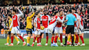 Myles Lewis-Skelly was shown a red card against Wolves.