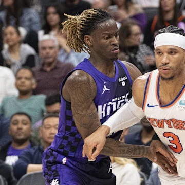 New York Knicks guard Josh Hart dribbles the basketball against Sacramento Kings guard Keon Ellis. Mandatory Credit: Kyle Terada-Imagn Images