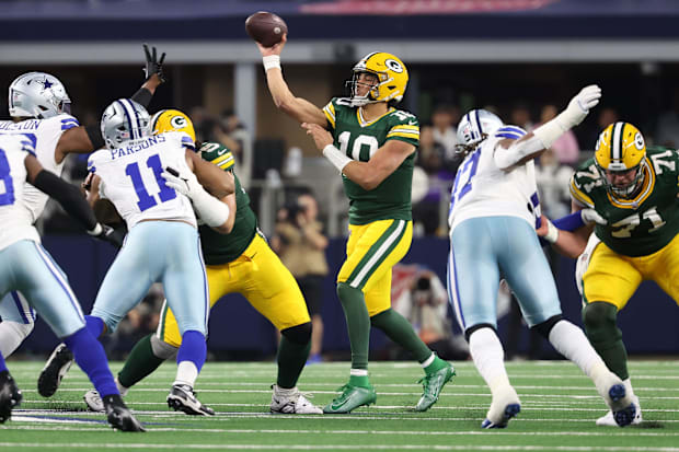 Packers QB Jordan Love drops back to pass against the Dallas Cowboys.