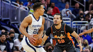 Feb 5, 2022; Orlando, Florida, USA; Memphis Grizzlies guard Desmond Bane (22) looks to pass against Orlando Magic guard Cole Anthony (50) during the first quarter at Amway Center. Mandatory Credit: Mike Watters-Imagn Images