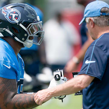 Tennessee Titans tackle JC Latham (55) goes through drills during mandatory Titans Minicamp at Ascension Saint Thomas Sports Park in Nashville, Tenn., Tuesday, June 10, 2025.