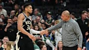Apr 27, 2025; Milwaukee, Wisconsin, USA; Milwaukee Bucks forward Giannis Antetokounmpo (34) exits the game in the fourth quarter as head coach Doc Rivers shakes his hand during game four against the Indiana Pacers of first round for the 2024 NBA Playoffs at Fiserv Forum. Mandatory Credit: Benny Sieu-Imagn Images