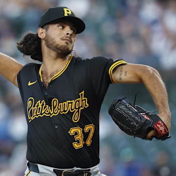 Sep 2, 2024; Chicago, Illinois, USA; Pittsburgh Pirates starting pitcher Jared Jones (37) delivers a pitch against the Chicago Cubs during the first inning at Wrigley Field. Mandatory Credit: Kamil Krzaczynski-Imagn Images