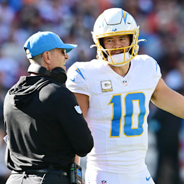 Justin Herbert and Jim Harbaugh look to lead the Chargers back to the playoffs with a 2025 win projection set at 9.5. 