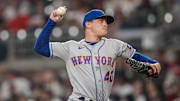 Aug 21, 2023; Cumberland, Georgia, USA; New York Mets relief pitcher Drew Smith (40)  pitches against the Atlanta Braves during the ninth inning at Truist Park. Mandatory Credit: Dale Zanine-Imagn Images