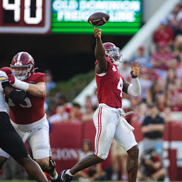 Alabama quarterback Jalen Milroe attempts a pass for the Crimson Tide.