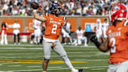 Feb 1, 2025; Mobile, AL, USA; American team quarterback Jaxson Dart of Ole Miss (2) during the first half of the 2025 Senior Bowl football game against the National team at Hancock Whitney Stadium.