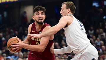 Feb 23, 2025; Cleveland, Ohio, USA; Cleveland Cavaliers guard Ty Jerome (2) drives to the basket against Memphis Grizzlies guard Luke Kennard (10) during the first half at Rocket Arena. Mandatory Credit: Ken Blaze-Imagn Images
