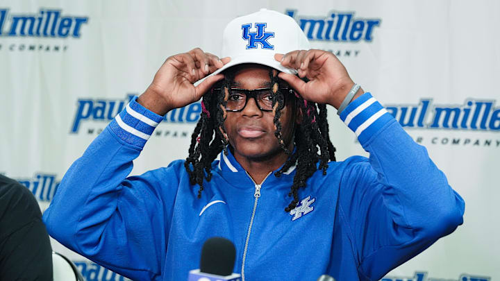 Jasper Johnson, a Lexington native and one of the top basketball players in the 2025 high school class, announces his commitment to the University of Kentucky during a ceremony at the Woodford County High School in Versailles, Ky. on Sep. 5, 2024. Jasper Johnson, a Lexington native and one of the top basketball players in the 2025 high school class, announces his commitment to the University of Kentucky during a ceremony at the Woodford County High School in Versailles, Ky. on Sep. 5, 2024.