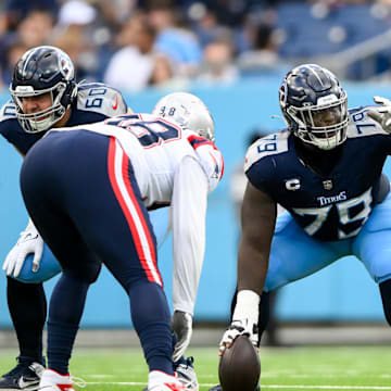 Tennessee Titans center Lloyd Cushenberry III calls out the audible against the New England Patriots. Mandatory Credit: Steve Roberts-Imagn Images