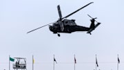 Army Blackhawk helicopters perform a flyover . Mandatory Credit: Mark J. Rebilas-Imagn Images
