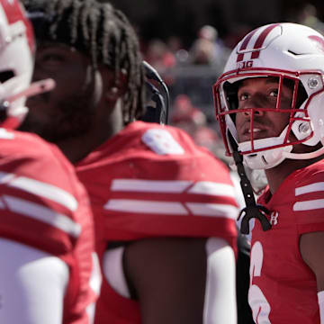 Xavier Lucas (6) watches Wisconsin's game against South Dakota in 2024.
