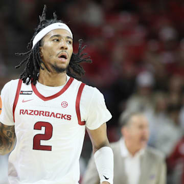 Arkansas Razorbacks guard Boogie Fland dribbles during the first half against the Florida Gators.