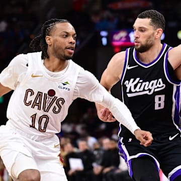 Apr 6, 2025; Cleveland, Ohio, USA; Cleveland Cavaliers guard Darius Garland (10) drives to the basket against Sacramento Kings guard Zach LaVine (8) during the second half at Rocket Arena. Mandatory Credit: Ken Blaze-Imagn Images
