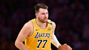 Los Angeles Lakers guard Luka Doncic dribbles the ball.
