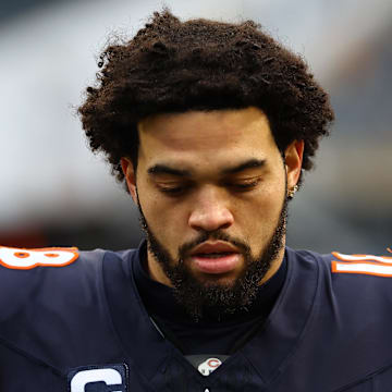 Chicago Bears quarterback Caleb Williams (18) walks off the field after the game against the Detroit Lions.